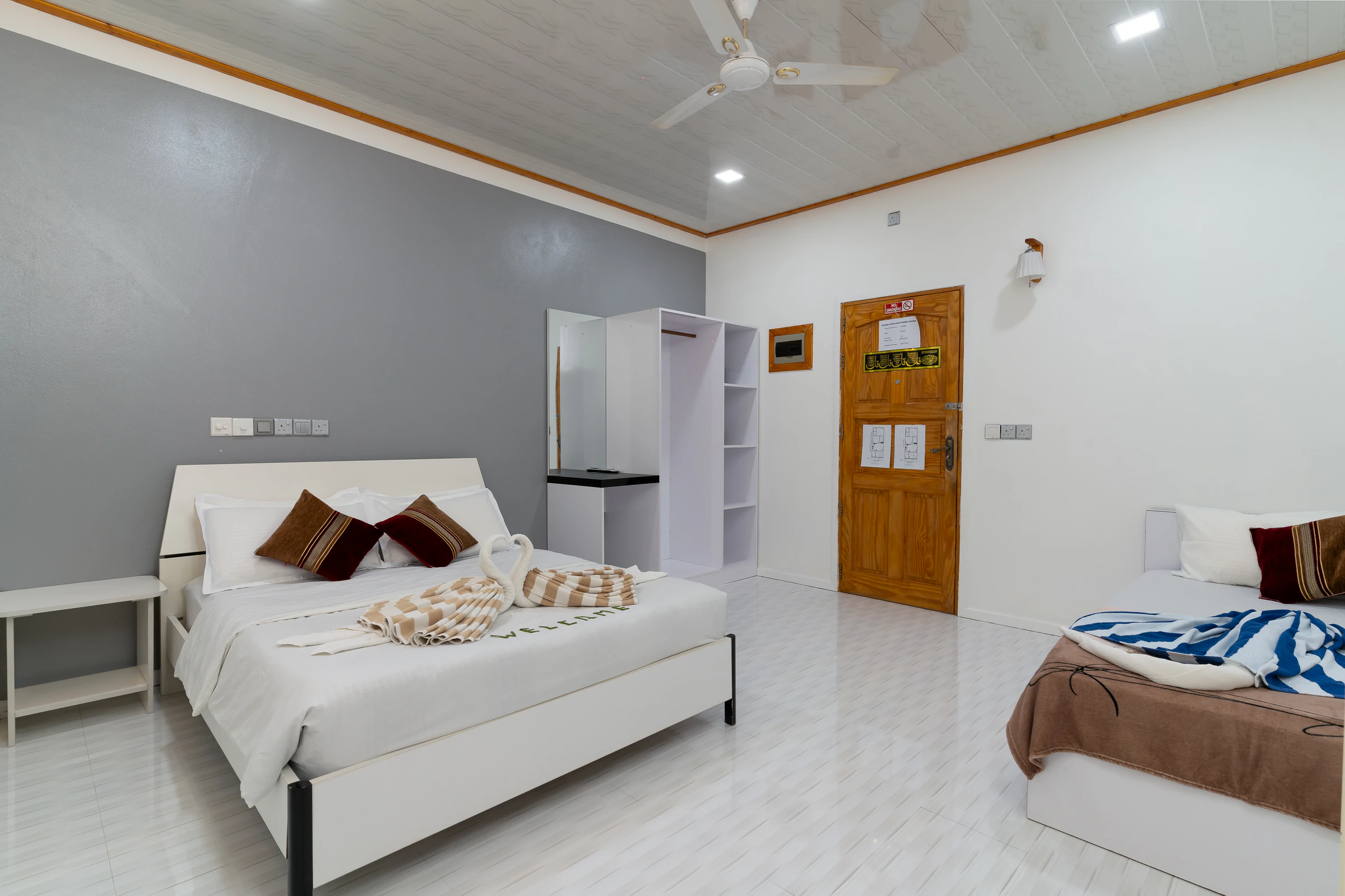 Bedroom two, one queen bed and one single bed
