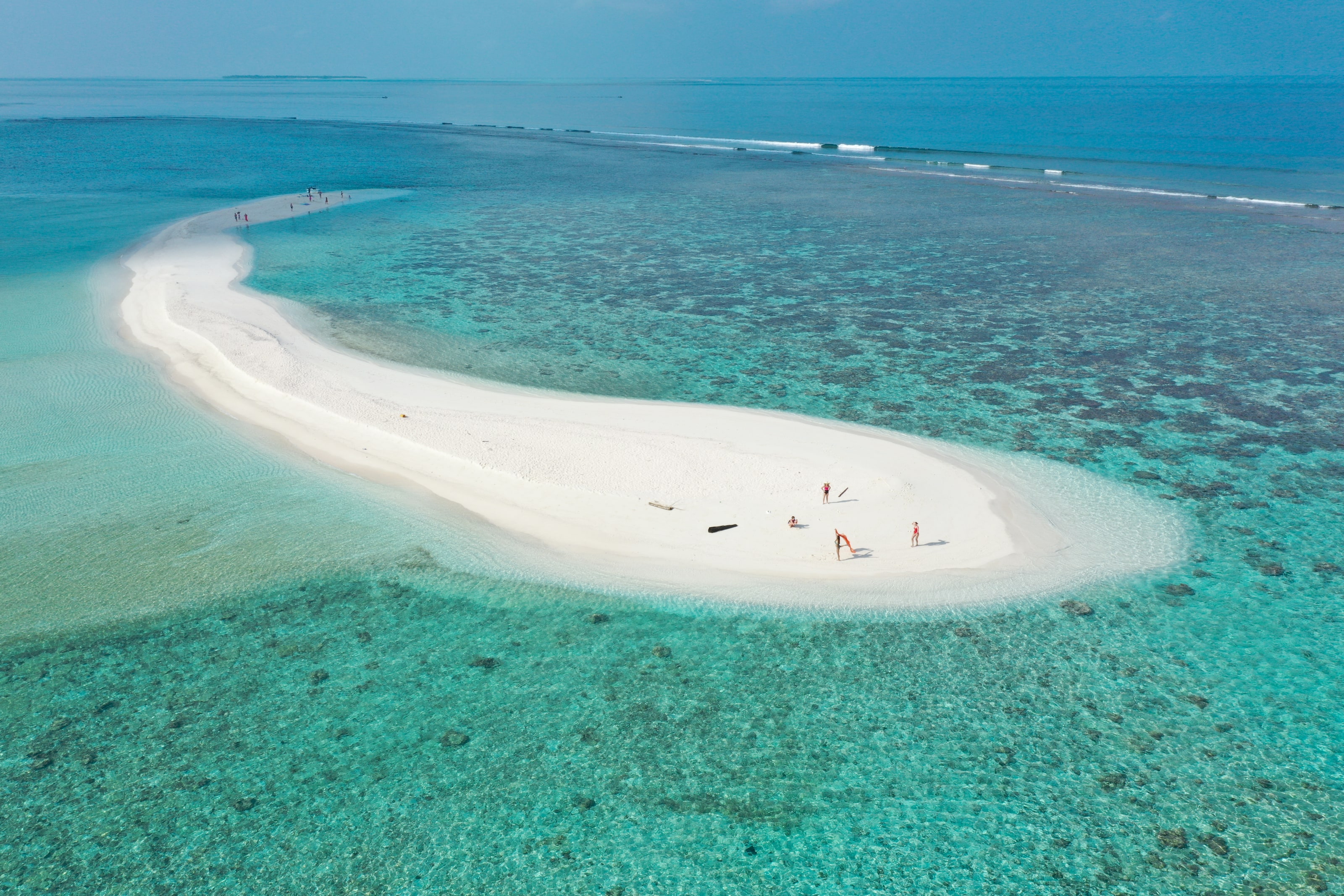 Aerial view of a sandbank near Ukulhas, ringed by reef