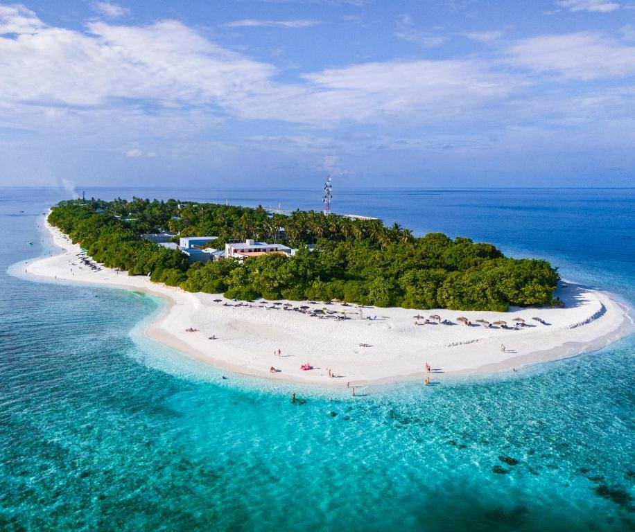 Ukulhas Island from above — the main beach and village visible from aerial view